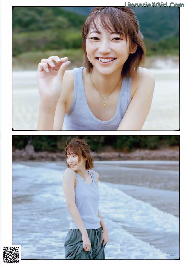 A woman standing on a beach next to a body of water.